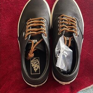 Vans Black and Brown Sneakers with Signature Waffle Sole
Unisex
M 6.5
W 8